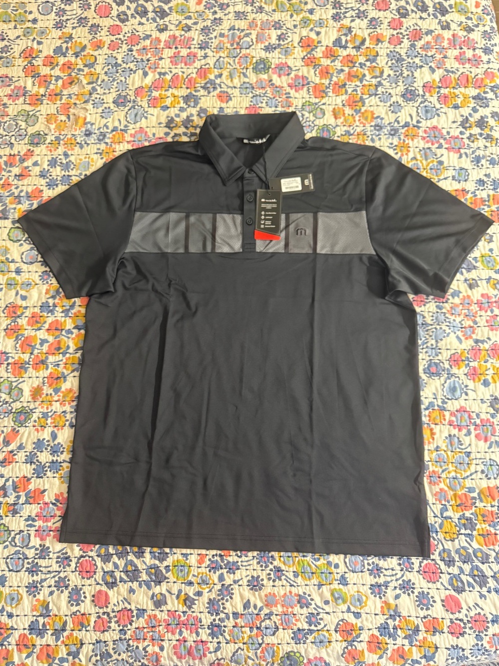 TravisMathew Black Performance Polo with Dark Gray Chest Panel